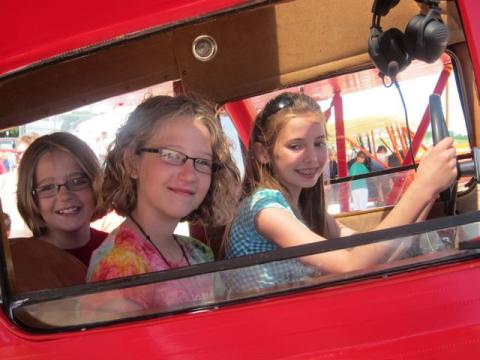 Young aviation enthusiasts enjoy the Waco YKS at Watertown.