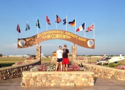 Kate with her cousin Nate Sova under the Brown Arch on the AirVenture
grounds. This was Nate’s first time at AirVenture, Kate’s 12th.