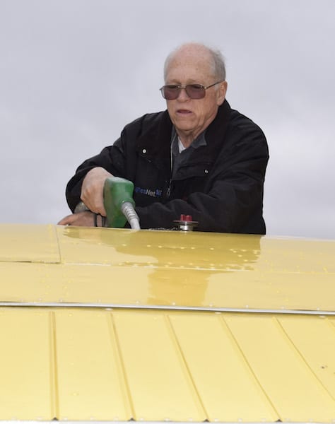 Alaska bush pilot Will Johnson fuels his aircraft prior to a flight to Chena Hot Springs.