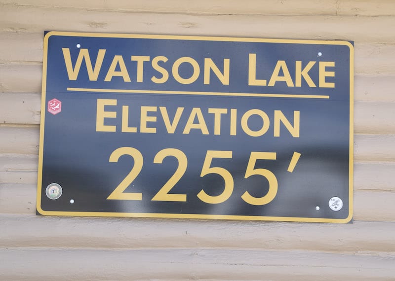 The field elevation marker at Watson Lake airport greets visitors to the main tower building at the airport.