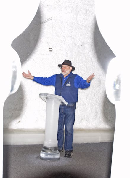 Chena Hot Springs Resort owner Bernie Karl addresses a tour group during a stop in the Aurora Ice Museum.