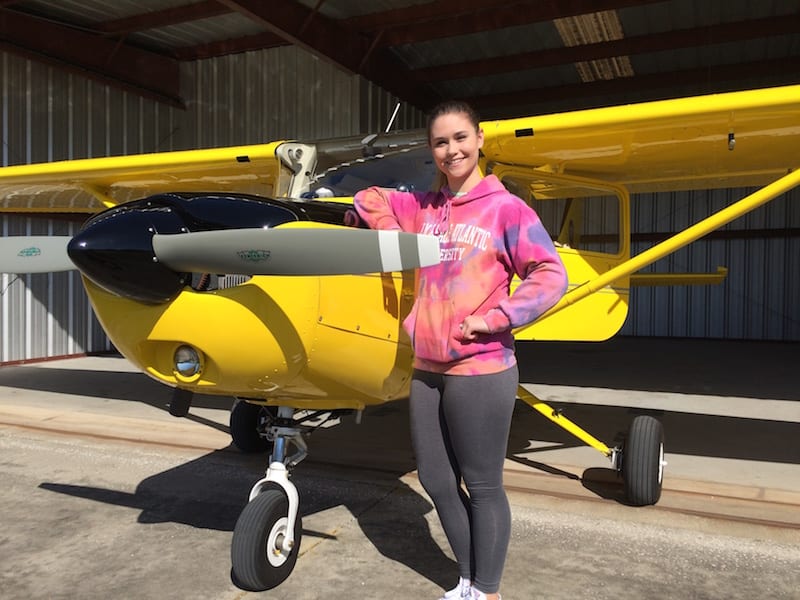 Eirlys Willis, moments after her first experience at the controls of an airplane in flight. She is seriously considering a career as a pilot.