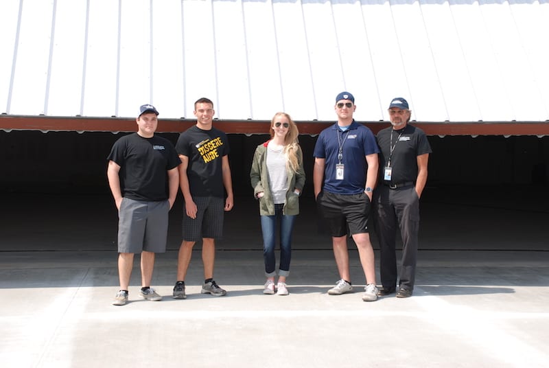 Standing outside the Lakeland Aero Club’s soon-to-be open hangar are members Dane Busone, P.J. Ohsiek, Cate Rosenoff, Phillip Herrington, and President Mike Zidzunas.