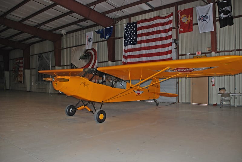 Lakeland Aero Club’s Piper Cub named Aunt Betty (N32721) awaits the move into the new hangar.