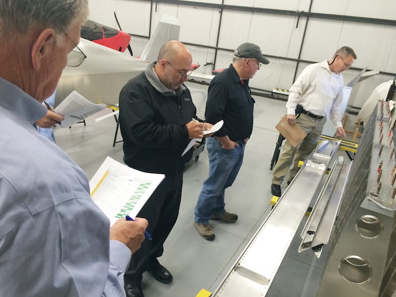 NKET members and trainees work with Sonex staff to evaluate the fabrication and assembly tasks required to build Sonex and Waiex B-Model wing panels.