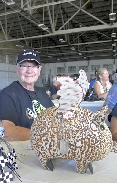 Jack Stanton, Race 94, with his hard-earned Flying Pig trophy. (Photo by William E. Dubois)