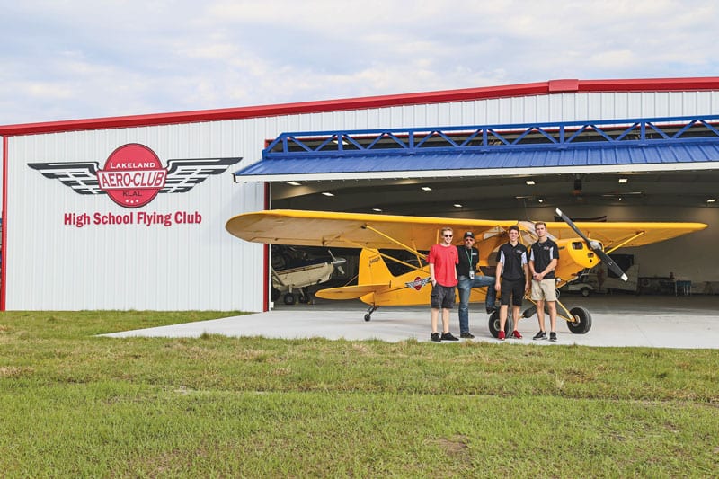 Lakeland Aero Club President Mike Zidziunas (second from left) with club members Trevor Penix, Michael Jenkins, and Tyson Trentham.