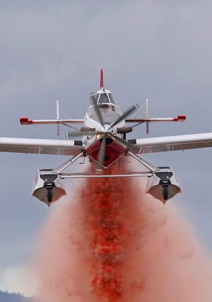 Air Tractor Fire Boss releases a load of fire retardant and water as aircraft systems were tested in preparation for the 2016 fire season on 10 March 2016 at Deer Park, Wash. Photo by Frederick A. Johnsen