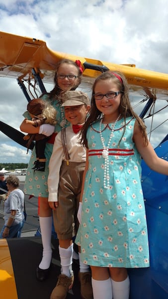 Rhodes, Wills and Rhys Johnson dressed the part and welcomed "Amelia Earhart" when she Revisted Greenville last Saturday at the Greenville Downtown Airport.