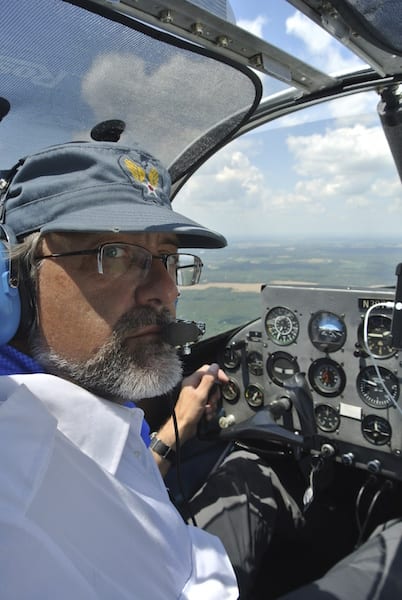 In the race cockpit after making the first turn the author scans for Race 23. Based on radio calls, he knows the other plane is hot on his twin tails. (Photo by William E. Dubois)