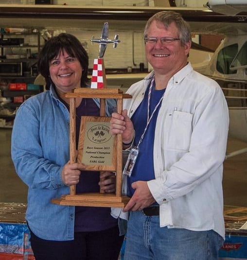 Linda Street-Ely and Mike Ely, of Race 55, with their fourth season First Place Champion trophy in the Factory Category at the end of last year’s season. (Photo by Jo Hunter) 