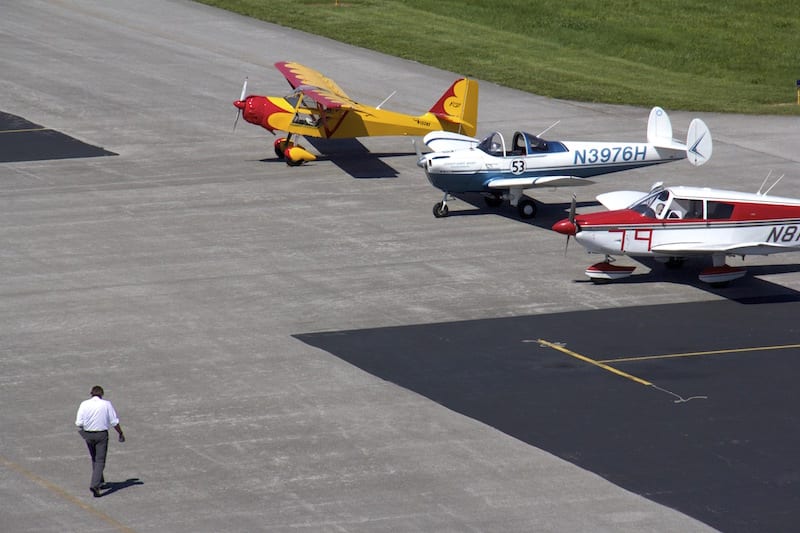 Air racer William E. Dubois makes his way across the apron to Race 53 shortly before engine start at the Big Muddy Air Race at the Southern Illinois Airport. (Photo by Lisa F. Bentson)