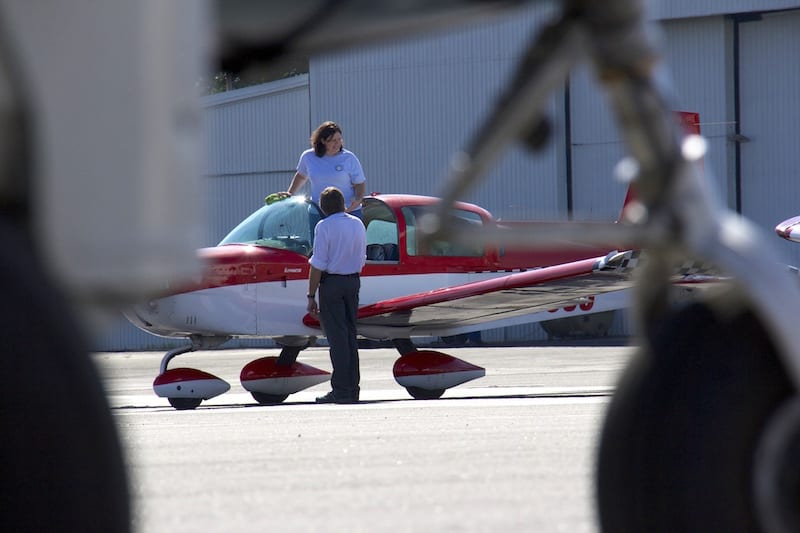 After the race, William E. Dubois of Race 53, and Linda-Street Ely of Race 55, congratulate each other on their runs at the 2106 Big Muddy Air Race. Although becoming increasingly fierce competitors, the competition remains friendly. At least on the ground. After all, air racers are still one big family. (Photo by Lisa F. Bentson) 