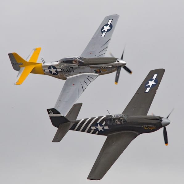 The Mustang story is told succinctly in this formation of an early P-51A and a late production P-51D at Chino. (Photo by Frederick A. Johnsen)