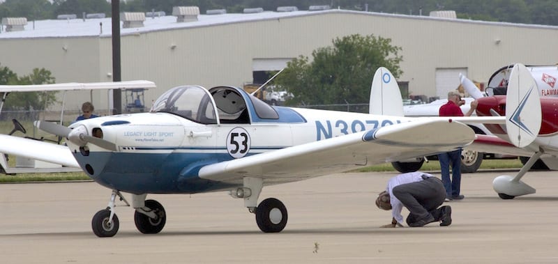 Meticulous pre-flight is required following a public viewing of the race planes. Racers had horror stories from the past of candy wrappers stuffed into hinge gaps, engine vents, pitot tubes, and more. (Photo by Lisa F. Bentson)