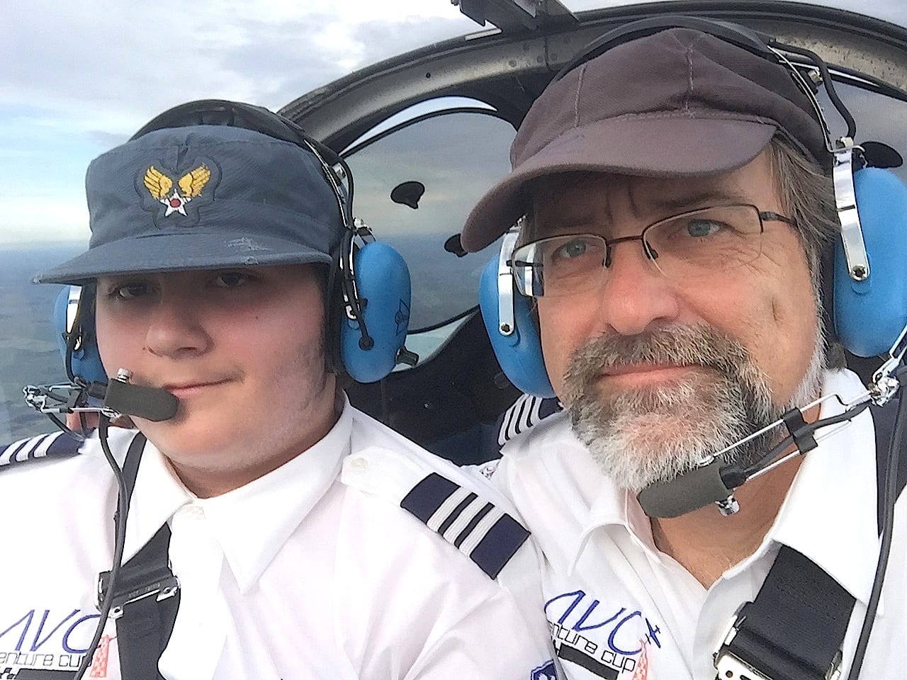 A happy moment early in the flight: Rio A. F. Dubois (left) pilots Race 53 shortly after take off, while pilot-in-command William E. Dubois scans the panel. 14-year-old Rio was the youngest certificated student pilot in this year’s race, and one of the youngest in race history. (Photo by William E. Dubois)