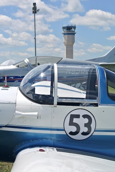 Race 53 at AirVenture in Oshkosh, WI, with a familiar air traffic control tower in the background. For one week each year, this tower is the busiest in the world. (Photo by William E. Dubois)