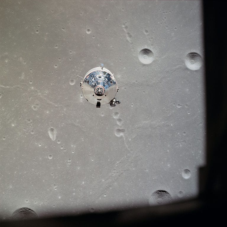 Apollo 11 Command/Service Module Columbia in lunar orbit, photographed from the Lunar Module Eagle. (NASA photo)