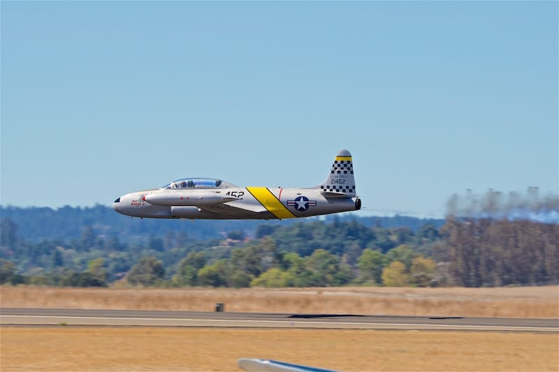 Greg Colyer performs a very low pass in his Lockheed T-33 Shooting Star during the show. In keeping with the Canadian theme of the show, this aircraft is actually a license-built Canadair CT-33.