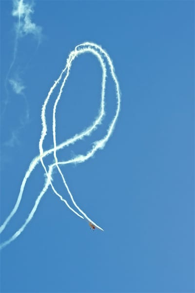 Kent Pietsch uses his 1941 Interstate Cadet as an aerial paintbrush during his aerobatic routine.