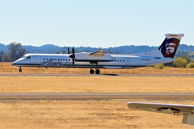 The airshow schedule had to work around regularly scheduled air traffic like this de Havilland Canada Dash-8 taking off.