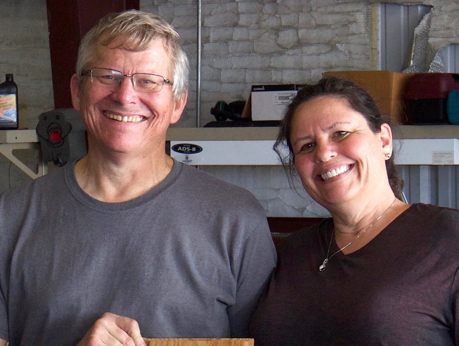 Mike and Linda Ely of Race 55, all smiles with victory in hand. Literally. (Photo by Lisa F. Bentson)