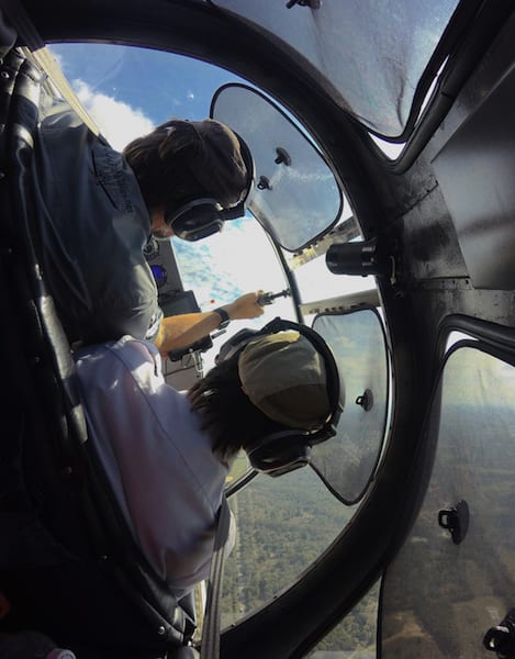 Inside Race 53’s cockpit on the racecourse as the plane turns sharply around the virtual pylon at Turn 1 above Granger Lake dam. The race plane is banking at approximately 75-degrees rounding the turn. (Photo by Lisa F. Bentson)