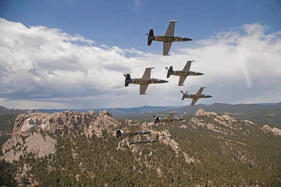 The team flying over Mt. Rushmore 